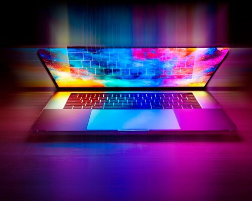 Adjusting the brightness slider on a modern laptop screen